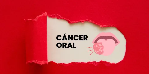 Papel rojo rasgado con el texto «cáncer oral» y la ilustración de una lengua con una lesión
